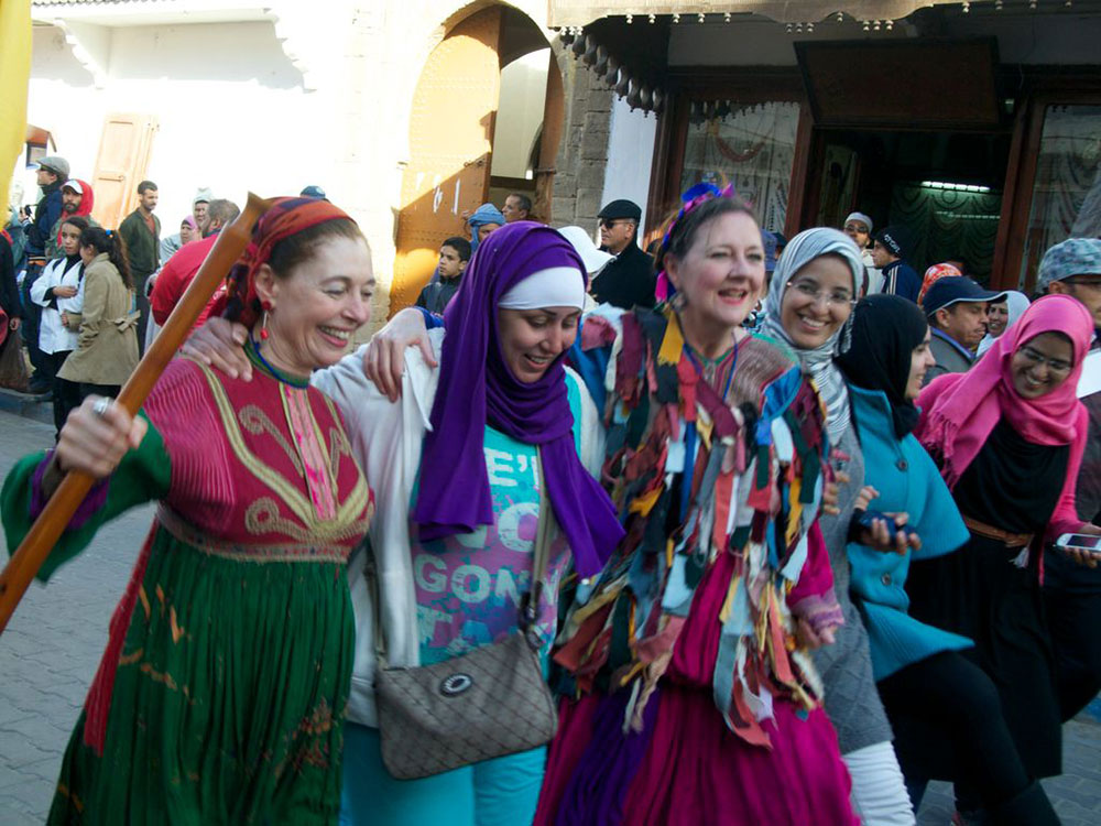 Shore to Shore Festival: British and Moroccan volunteers at the parade in Essaouira, Morocco